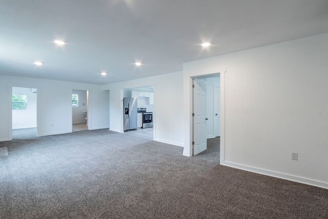 2612 S Oak Trl, Granbury, TX 76048 - carpeted empty room featuring baseboards and recessed lighting