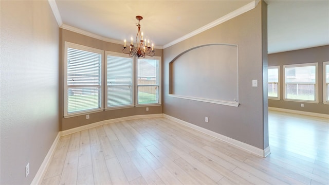 3114 Flowering Springs Dr, Forney, TX 75126 - empty room featuring a chandelier, healthy amount of natural light, light wood-style floors, baseboards, and ornamental molding