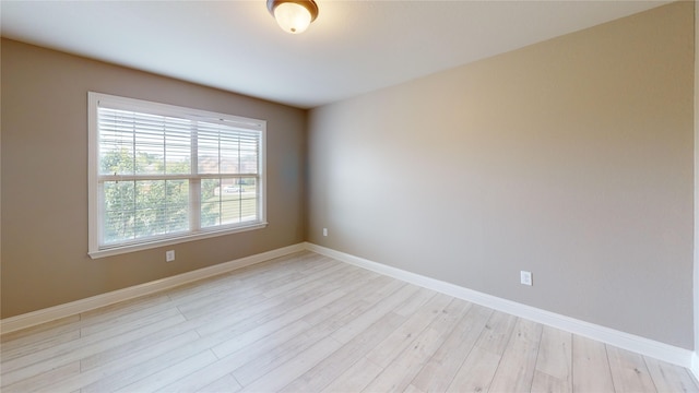 3114 Flowering Springs Dr, Forney, TX 75126 - empty room with light wood-style flooring and baseboards