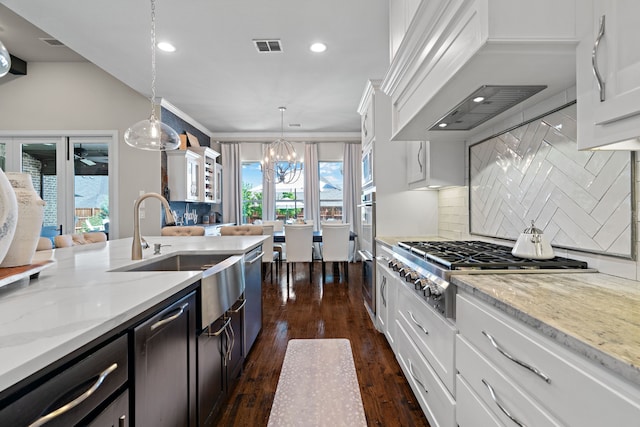 412 Appaloosa Run, Argyle, TX 76226 - kitchen featuring stainless steel appliances, a chandelier, recessed lighting, custom exhaust hood, and dark wood finished floors