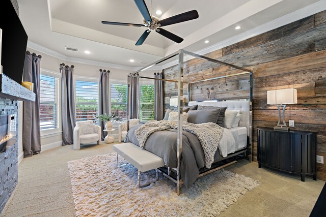 412 Appaloosa Run, Argyle, TX 76226 - bedroom featuring wood walls, carpet flooring, recessed lighting, a fireplace, and a raised ceiling