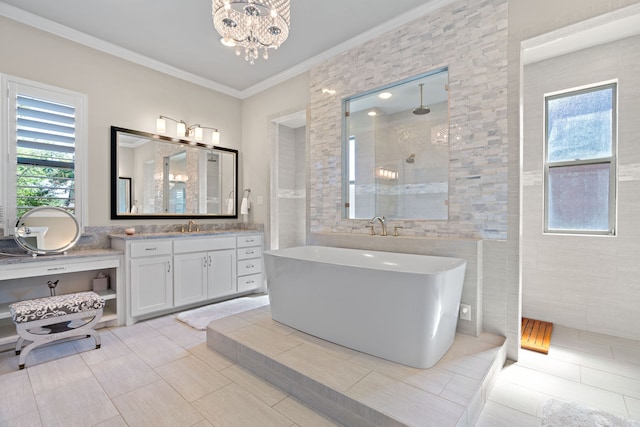 412 Appaloosa Run, Argyle, TX 76226 - bathroom with tiled shower, ornamental molding, vanity, a chandelier, and a soaking tub