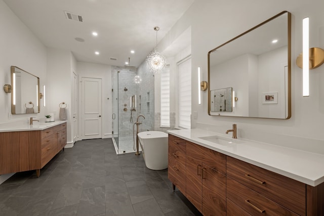 608 King Ranch Rd, Southlake, TX 76092 - bathroom featuring a stall shower, two vanities, a soaking tub, and recessed lighting