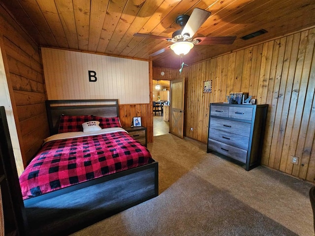 2488 Fm 2138 N, Jacksonville, TX 75766 - carpeted bedroom featuring wooden walls and wood ceiling