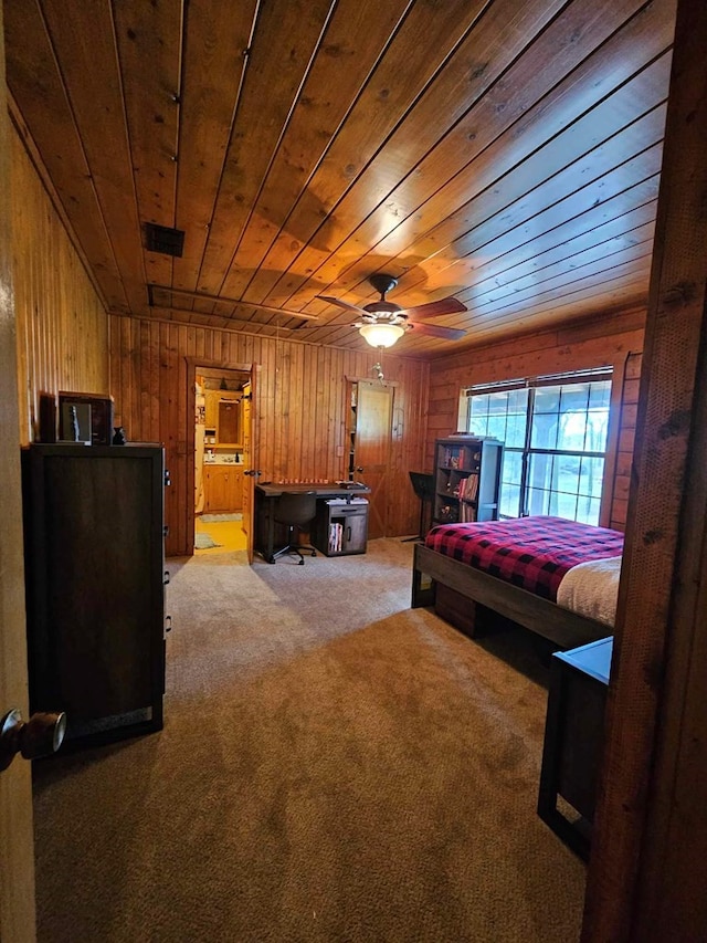 2488 Fm 2138 N, Jacksonville, TX 75766 - bedroom with light carpet, wood ceiling, and wooden walls