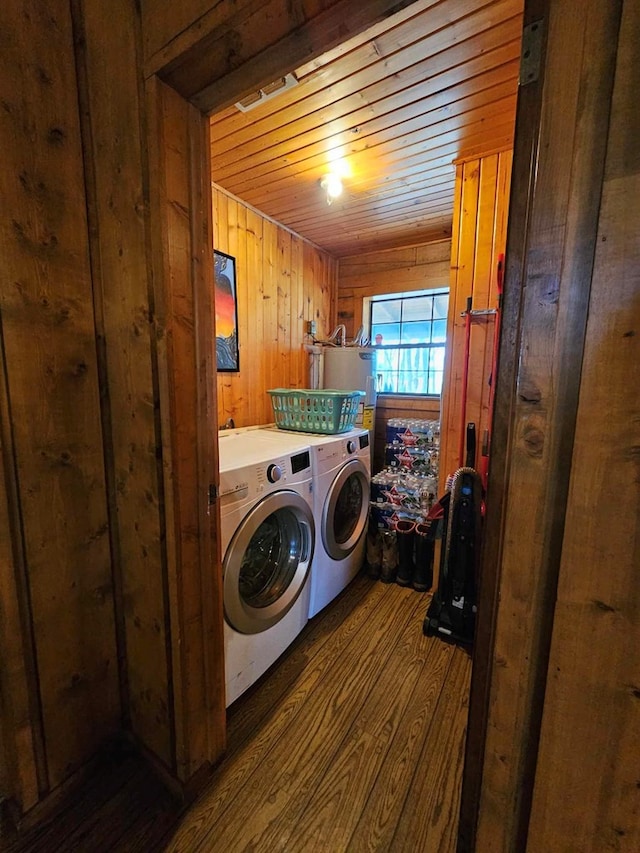 2488 Fm 2138 N, Jacksonville, TX 75766 - clothes washing area featuring separate washer and dryer, dark wood-style floors, wood walls, and wooden ceiling