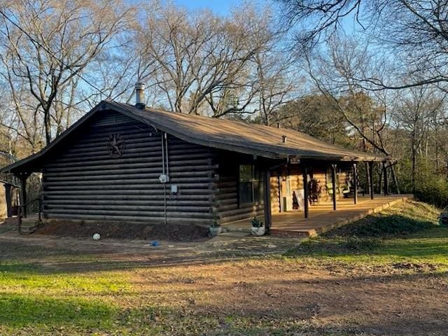 2488 Fm 2138 N, Jacksonville, TX 75766 - view of property exterior with log siding
