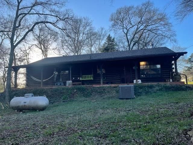 2488 Fm 2138 N, Jacksonville, TX 75766 - back of house with log exterior and central AC