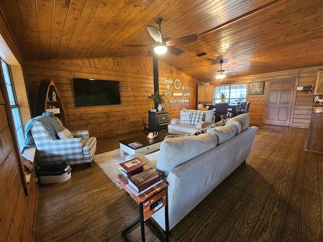 2488 Fm 2138 N, Jacksonville, TX 75766 - living room featuring lofted ceiling, wooden ceiling, wood finished floors, wooden walls, and a ceiling fan