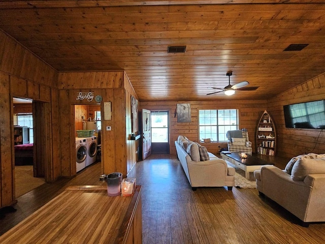 2488 Fm 2138 N, Jacksonville, TX 75766 - living room featuring wooden walls, wood ceiling, separate washer and dryer, vaulted ceiling, and wood finished floors