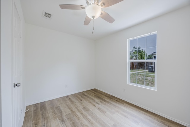 2741 Ivandell Ave, Dallas, TX 75211 - spare room featuring wood finished floors, baseboards, and ceiling fan