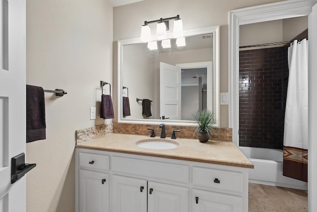 bathroom with vanity and shower / bath combo with shower curtain