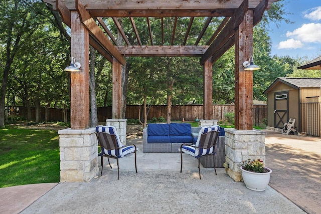 view of patio / terrace featuring an outdoor hangout area, a storage shed, a pergola, and an outdoor structure