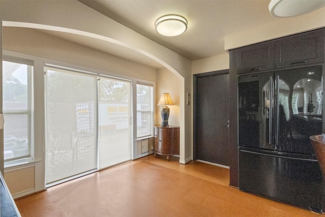 10209 Solta Dr, Dallas, TX 75218 - unfurnished room featuring arched walkways and baseboards