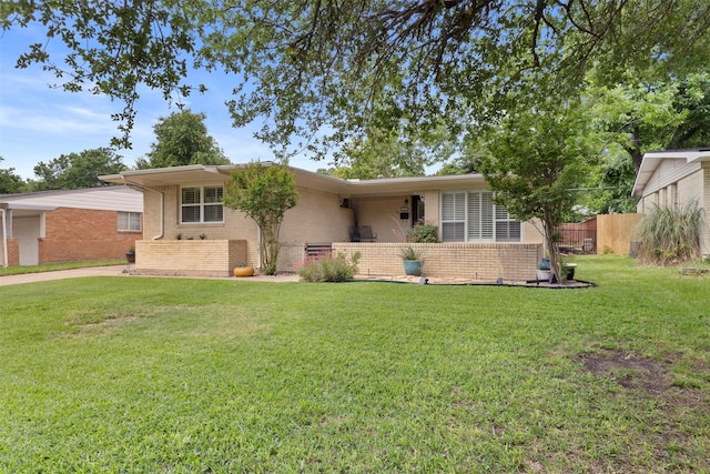 10209 Solta Dr, Dallas, TX 75218 - single story home with brick siding