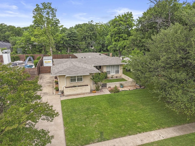 10209 Solta Dr, Dallas, TX 75218 - view of front of house featuring a front lawn and roof with shingles