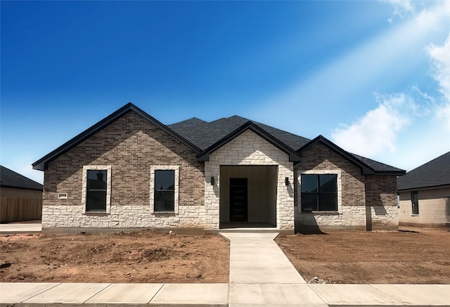 6710 Windmill Grass Ln, Abilene, TX 79606 - view of front facade featuring brick siding