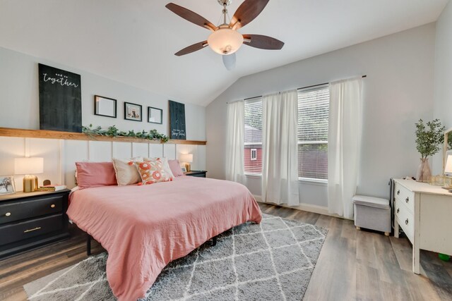 110 Redwood, Terrell, TX 75160 - bedroom featuring vaulted ceiling, wood finished floors, and ceiling fan