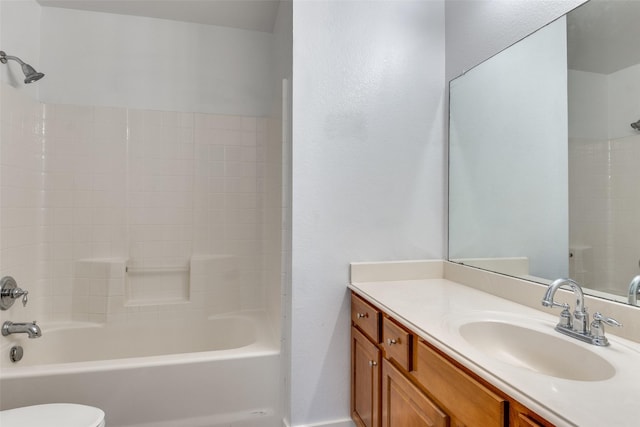 full bathroom featuring toilet, vanity, and  shower combination