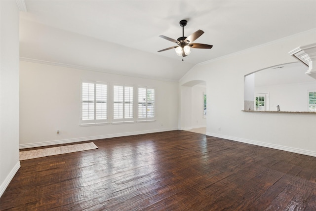 9709 Maryville Ln, Fort Worth, TX 76108 - unfurnished living room with a ceiling fan, wood finished floors, baseboards, arched walkways, and crown molding