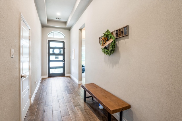 827 Esk Ave, Celina, TX 75009 - entrance foyer with a tray ceiling, dark wood-style flooring, and baseboards