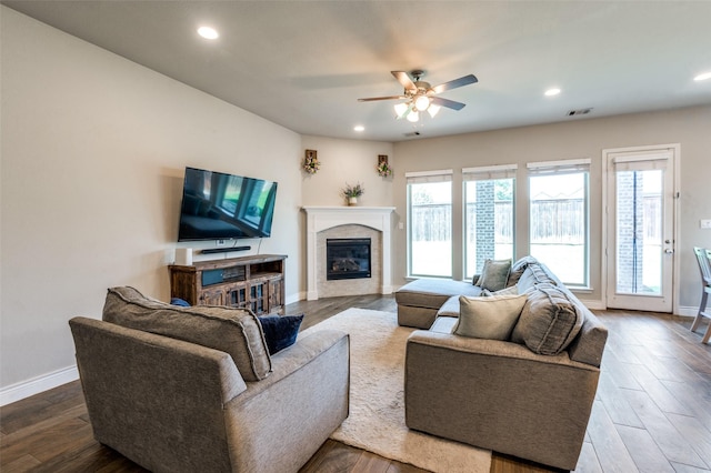 827 Esk Ave, Celina, TX 75009 - living area featuring recessed lighting, a glass covered fireplace, ceiling fan, baseboards, and dark wood finished floors