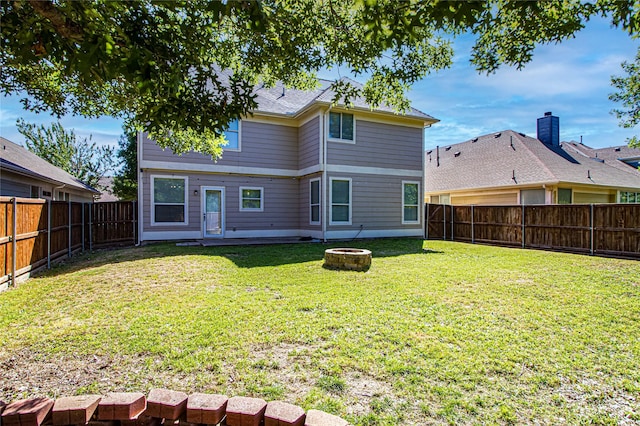 9908 Summer Sweet Dr, Mckinney, TX 75072 - back of house featuring a fire pit