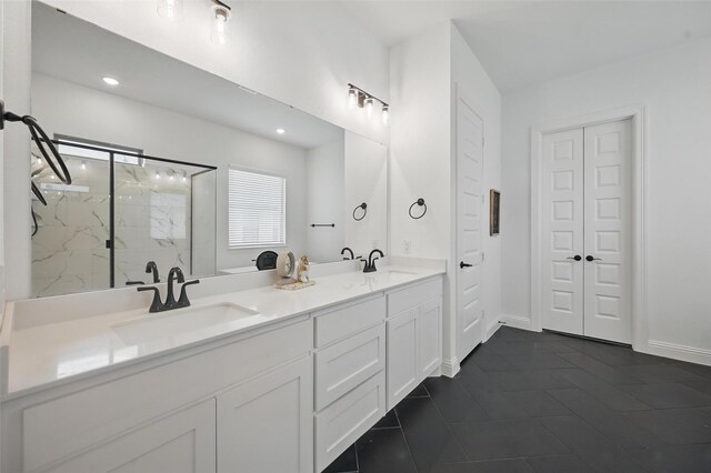 513 Fieldstone Ln, Haslet, TX 76052 - bathroom featuring a marble finish shower, double vanity, tile patterned floors, and recessed lighting
