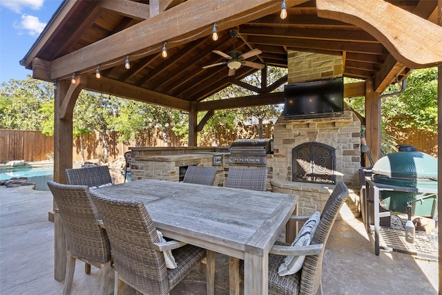 11353 Seaside Ln, Frisco, TX 75035 - view of patio with grilling area, a gazebo, an outdoor kitchen, and a fenced backyard