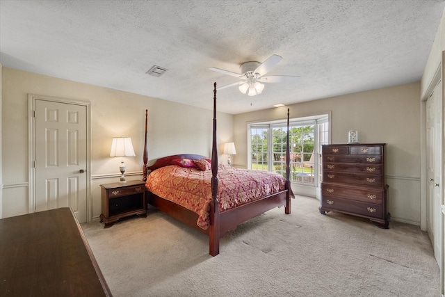301 Peachtree St, Fairfield, TX 75840 - bedroom featuring carpet, a textured ceiling, and ceiling fan