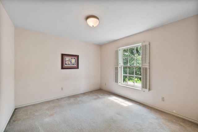 301 Peachtree St, Fairfield, TX 75840 - carpeted empty room featuring baseboards