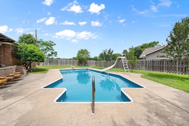 301 Peachtree St, Fairfield, TX 75840 - view of swimming pool with a water slide, a patio area, and a diving board