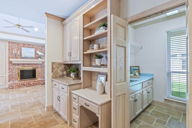 3441 Mount Vernon Way, Plano, TX 75025 - kitchen featuring stone tile floors, open shelves, healthy amount of natural light, a ceiling fan, and ornamental molding