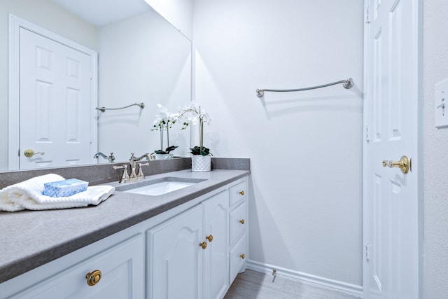 3441 Mount Vernon Way, Plano, TX 75025 - bathroom featuring vanity and baseboards