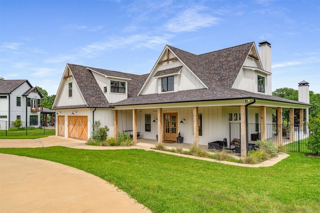 205 Oak Creek Dr, Tool, TX 75143 - modern farmhouse style home with a chimney, concrete driveway, french doors, roof with shingles, and covered porch