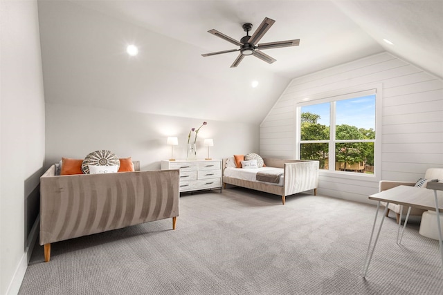 205 Oak Creek Dr, Tool, TX 75143 - carpeted bedroom featuring vaulted ceiling, wooden walls, and ceiling fan