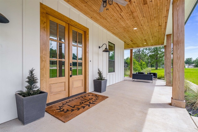 205 Oak Creek Dr, Tool, TX 75143 - doorway to property featuring board and batten siding and french doors