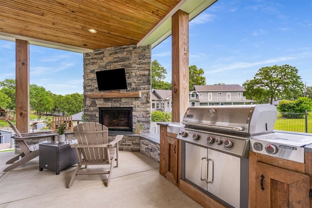 205 Oak Creek Dr, Tool, TX 75143 - view of patio featuring an outdoor stone fireplace and area for grilling