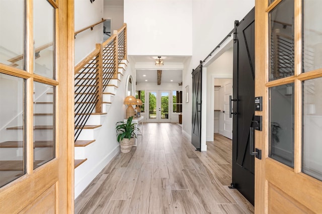 205 Oak Creek Dr, Tool, TX 75143 - entryway with light wood-style flooring, baseboards, french doors, and stairway
