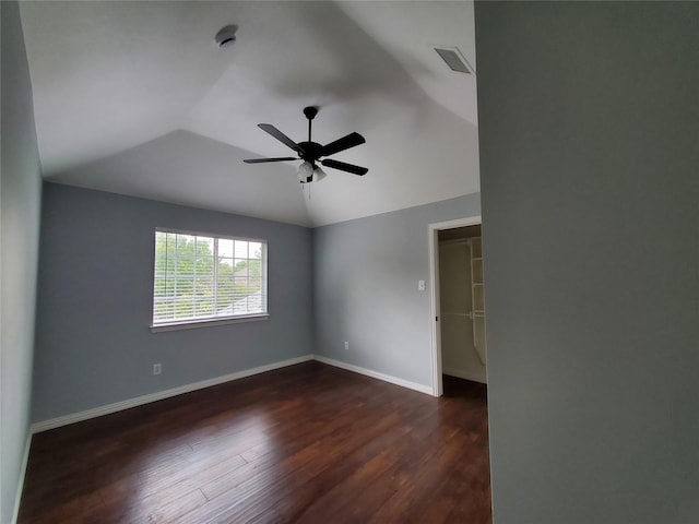 3725 Hibbs St, Plano, TX 75025 - empty room featuring dark wood-type flooring, lofted ceiling, ceiling fan, and baseboards