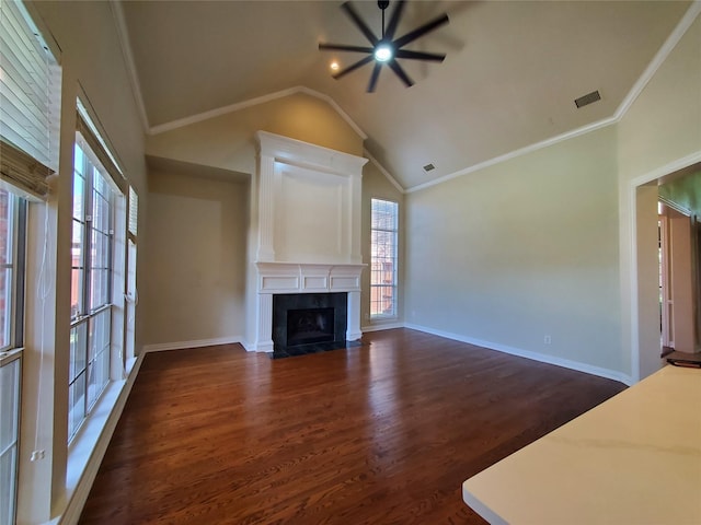 3725 Hibbs St, Plano, TX 75025 - unfurnished living room with a fireplace with flush hearth, dark wood-style flooring, lofted ceiling, baseboards, and crown molding