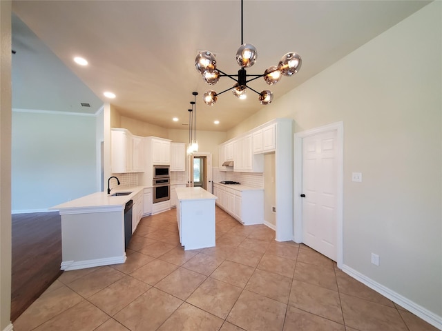 3725 Hibbs St, Plano, TX 75025 - kitchen with appliances with stainless steel finishes, a sink, backsplash, a chandelier, and recessed lighting