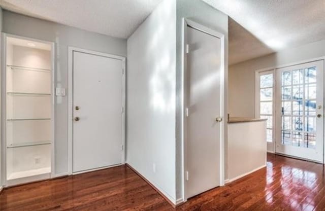 5232 Fleetwood Oaks Ave Unit 216, Dallas, TX 75235 - entryway with wood finished floors