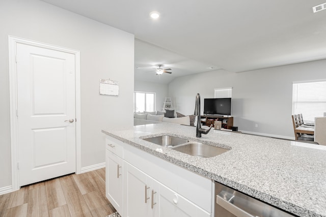 333 Mohan Dr, Royse City, TX 75189 - kitchen with dishwasher, a sink, white cabinetry, ceiling fan, and open floor plan