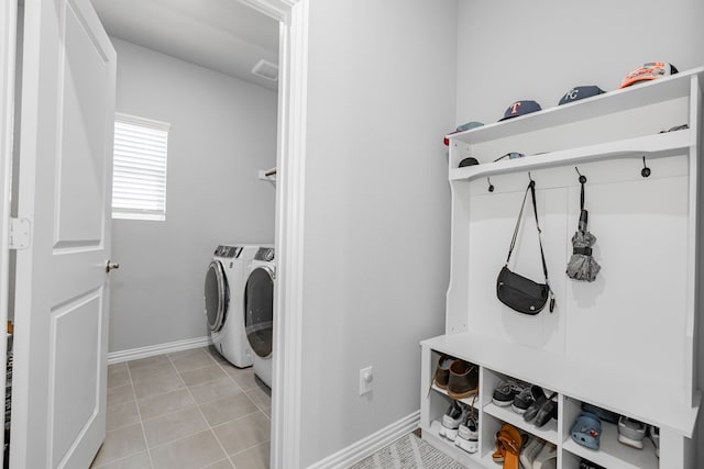 333 Mohan Dr, Royse City, TX 75189 - clothes washing area featuring washing machine and clothes dryer and baseboards