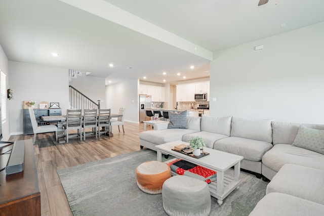 333 Mohan Dr, Royse City, TX 75189 - living room featuring light wood-style floors, recessed lighting, baseboards, stairs, and a ceiling fan