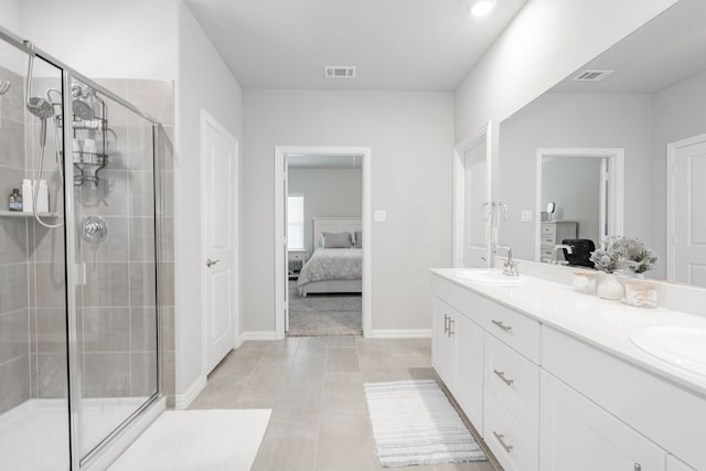 333 Mohan Dr, Royse City, TX 75189 - bathroom featuring ensuite bathroom, a stall shower, double vanity, and baseboards