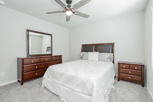 333 Mohan Dr, Royse City, TX 75189 - bedroom featuring light carpet, baseboards, and a ceiling fan