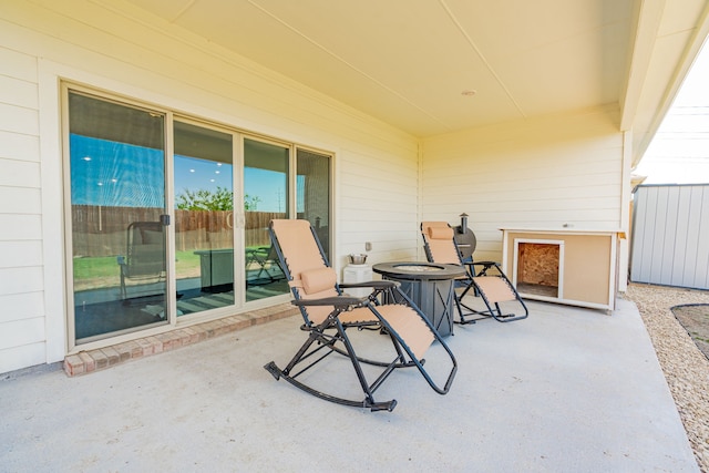 333 Mohan Dr, Royse City, TX 75189 - view of patio featuring a fire pit and fence