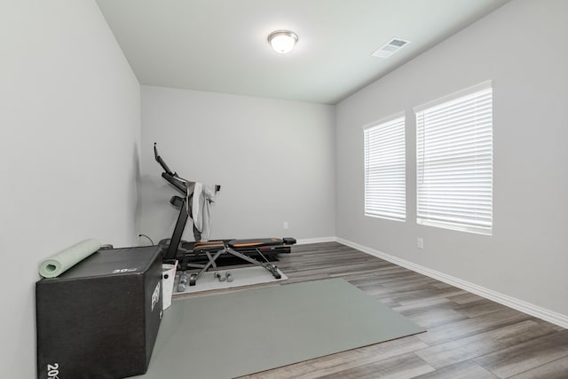 333 Mohan Dr, Royse City, TX 75189 - exercise room featuring wood finished floors and baseboards